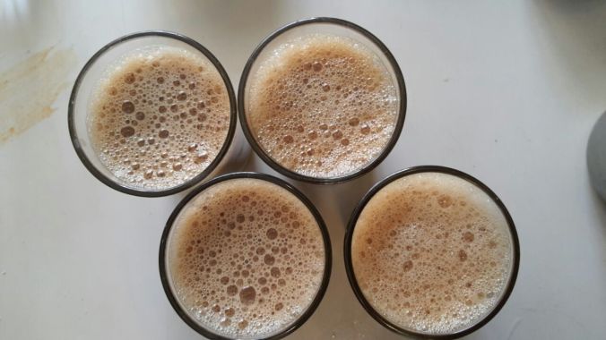 Fresh coffee in short glasses , not cups