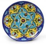 ceramic pottery with indigo, blue, yellow and green floral designs, the sandalwood room