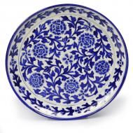 blue pottery wall plate with floral patterns, the sandalwood room