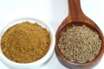 Closeup view of cumin and cumin powder