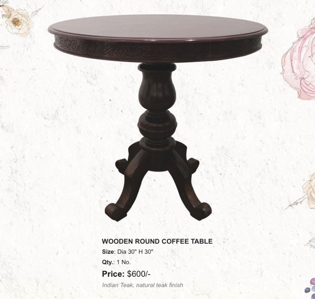 wooden round coffee table. the sandalwood room