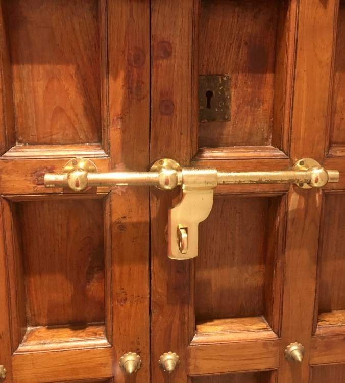 indian teak wood shutters with brass knobs, brass shooter bolt and handle